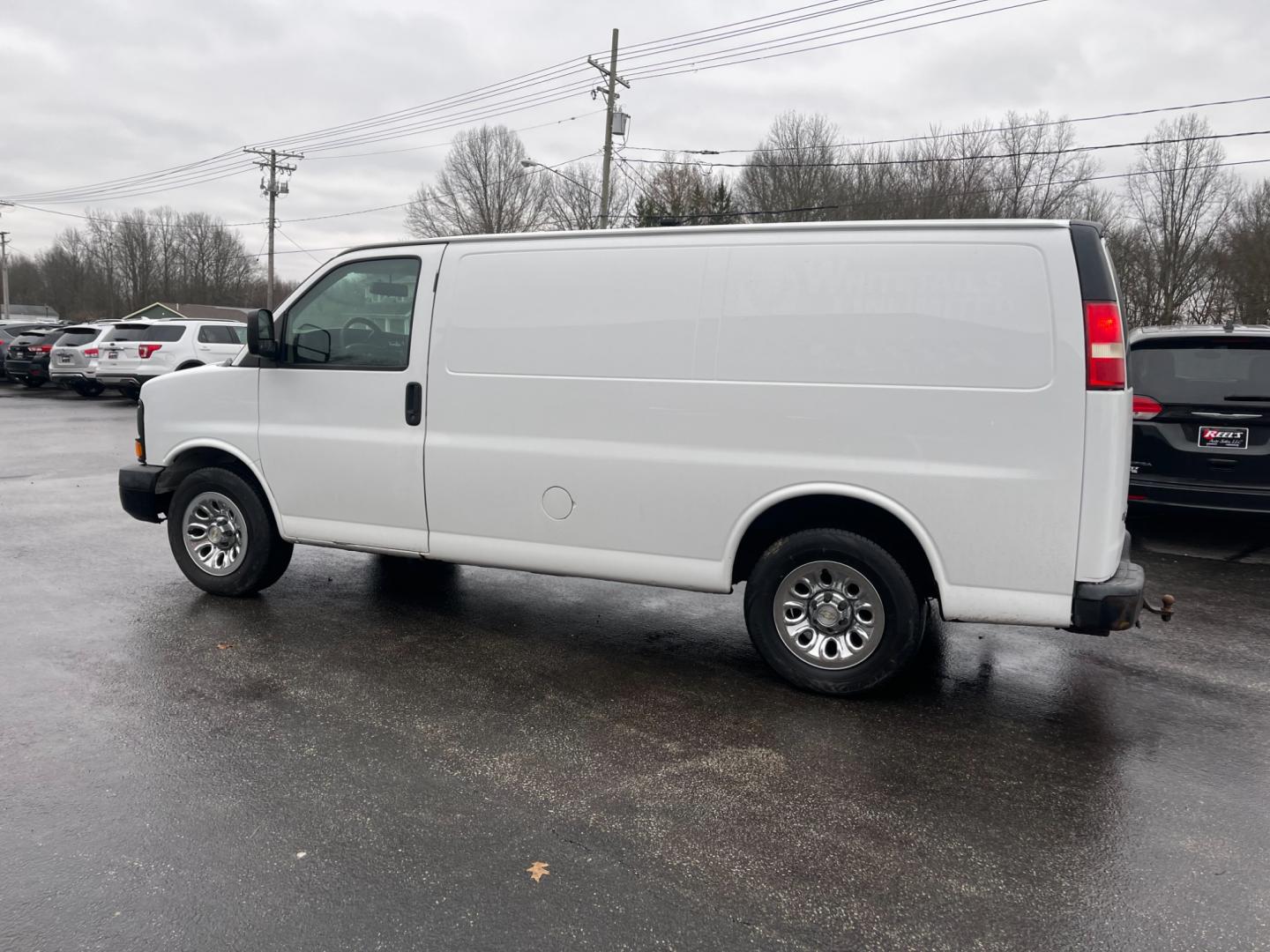 2014 White /Neutral Chevrolet Express 1500 AWD Cargo (1GCSHAF4XE1) with an 5.3L V8 OHV 16V FFV engine, 4-Speed Automatic transmission, located at 547 E. Main St., Orwell, OH, 44076, (440) 437-5893, 41.535435, -80.847855 - Photo#11